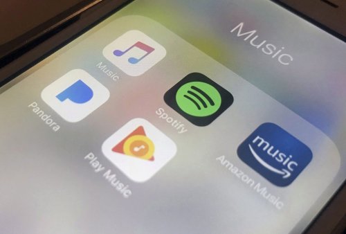 Music streaming apps appear on an iPhone on Jan. 28, 2018. THE CANADIAN PRESS/AP-Jenny Kane
