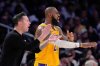 FILE - Los Angeles Lakers head coach JJ Redick, left, and forward LeBron James yell to the referees during the second half of an NBA basketball game against the Golden State Warriors Thursday, April 3, 2025, in Los Angeles. (AP Photo/Mark J. Terrill, File)