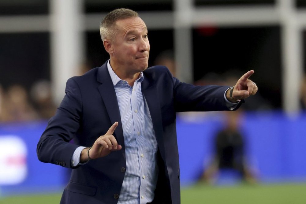 FILE - New England Revolution coach Caleb Porter gestures during the first half of the team's MLS soccer match against the Vancouver Whitecaps, Saturday, June 15, 2024, in Foxborough, Mass. (AP Photo/Mark Stockwell, File)