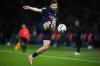 PSG's Khvicha Kvaratskhelia controls the ball during the French League One soccer match between Paris Saint-Germain and Auxerre at the Parc des Princes in Paris, Saturday, Sept. 27, 2025. (AP Photo/Thibault Camus)