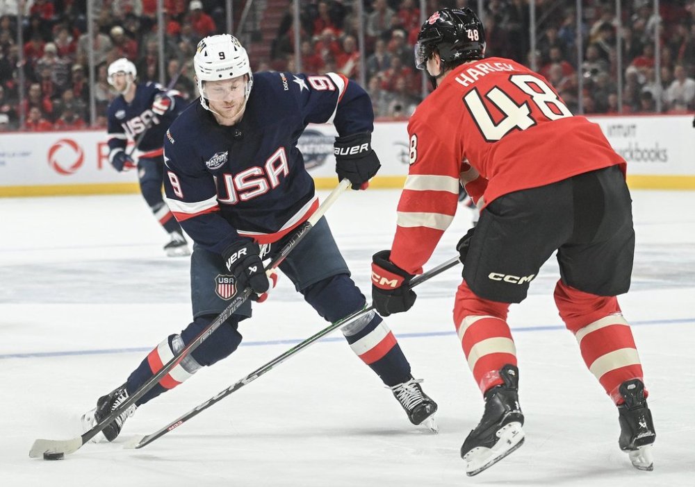 United States' Jack Eichel (9) takes a shot as Canada's Thomas Harley (48) defends during second period 4 Nations Face-Off hockey action in Montreal, Saturday, Feb. 15, 2025. THE CANADIAN PRESS/Graham Hughes