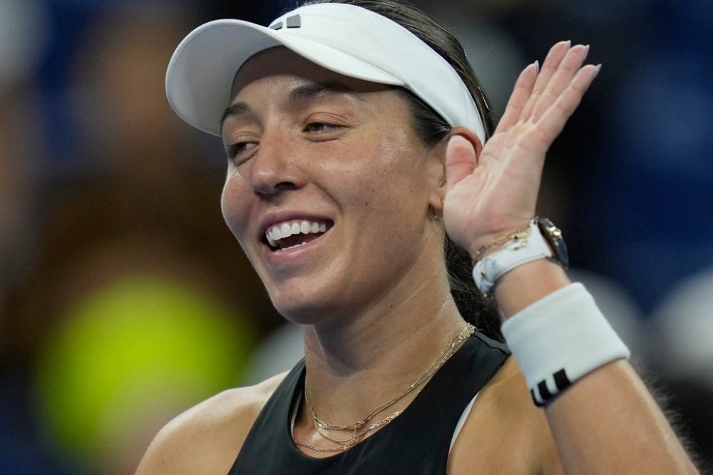 Jessica Pegula of the United States reacts after defeating compatriot Emma Navarro in a women's singles quarterfinal match of the China Open tennis tournament in Beijing, China, Friday, Oct. 3, 2025. (AP Photo/Ng Han Guan)