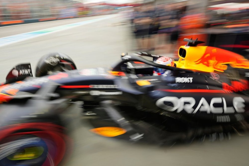Red Bull driver Max Verstappen of the Netherlands drives out of his garage during the first practice session of the Singapore Formula One Grand Prix at the Marina Bay Street Circuit in Singapore, Friday, Oct. 3, 2025. (AP Photo/Vincent Thian)