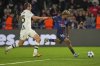 FILE - PSG's Ibrahim Mbaye, right, in action against Atalanta's Marten de Roon during the Champions League opening phase soccer match between Paris Saint-Germain and Atalanta at the Parc des Princes stadium in Paris, France, Wednesday, Sept. 17, 2025. (AP Photo/Thibault Camus, File)