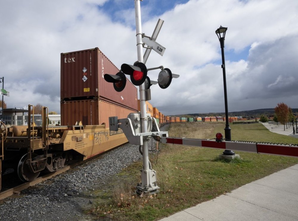 A train goes through downtown Lac-Mégantic, Que. on Wednesday, Oct. 16, 2024. THE CANADIAN PRESS/Ryan Remiorz