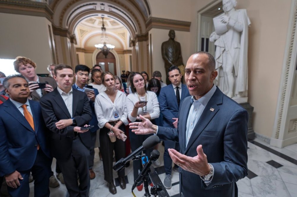 House Minority Leader Hakeem Jeffries, D-N.Y., speaks with reporters before he and the top congressional leaders go to the White House to meet with President Donald Trump on the looming government funding crisis, at the Capitol in Washington, Monday, Sept. 29, 2025. (AP Photo/J. Scott Applewhite)