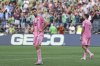 Inter Miami midfielder Sergio Busquets (5) and midfielder Rodrigo De Paul (7) react after a goal by Seattle Sounders midfielder Paul Rothrock during the Leagues Cup final soccer match Sunday, Aug. 31, 2025, in Seattle. (AP Photo/Lindsey Wasson)