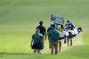 The group of Vince Whaley and Max Homa walks down the No. 1 fairway during the fourth round of the Sanderson Farms Championship golf tournament, Sunday, Oct. 5, 2025, in Jackson, Miss. (AP Photo/Rogelio V. Solis)