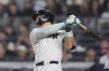 New York Yankees' Aaron Judge hits a home run during the first inning of a baseball game against the Detroit Tigers Tuesday, Sept. 9, 2025, in New York. (AP Photo/Frank Franklin II)