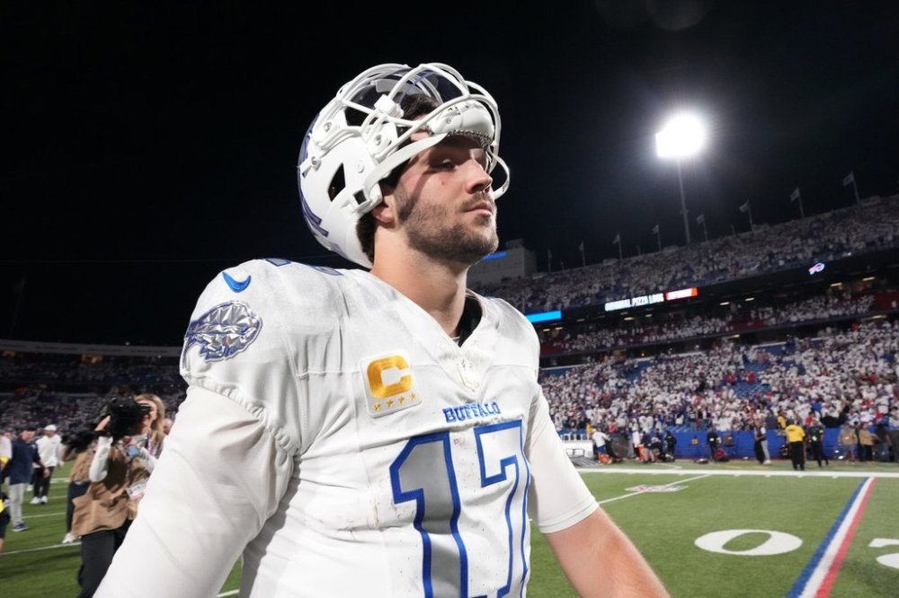 Buffalo Bills quarterback Josh Allen (17) walks off the field after the team's loss to the New England Patriots in an NFL football game, Sunday, Sept. 5, 2025, in Orchard Park, N.Y. (AP Photo/Gene J. Puskar)