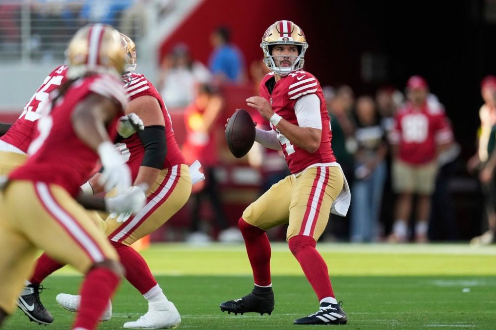 FILE - San Francisco 49ers quarterback Carter Bradley looks to pass during the first half of an NFL preseason football game against the Los Angeles Chargers, Saturday, Aug. 23, 2025, in Santa Clara, Calif. (AP Photo/Godofredo A. Vásquez, File)