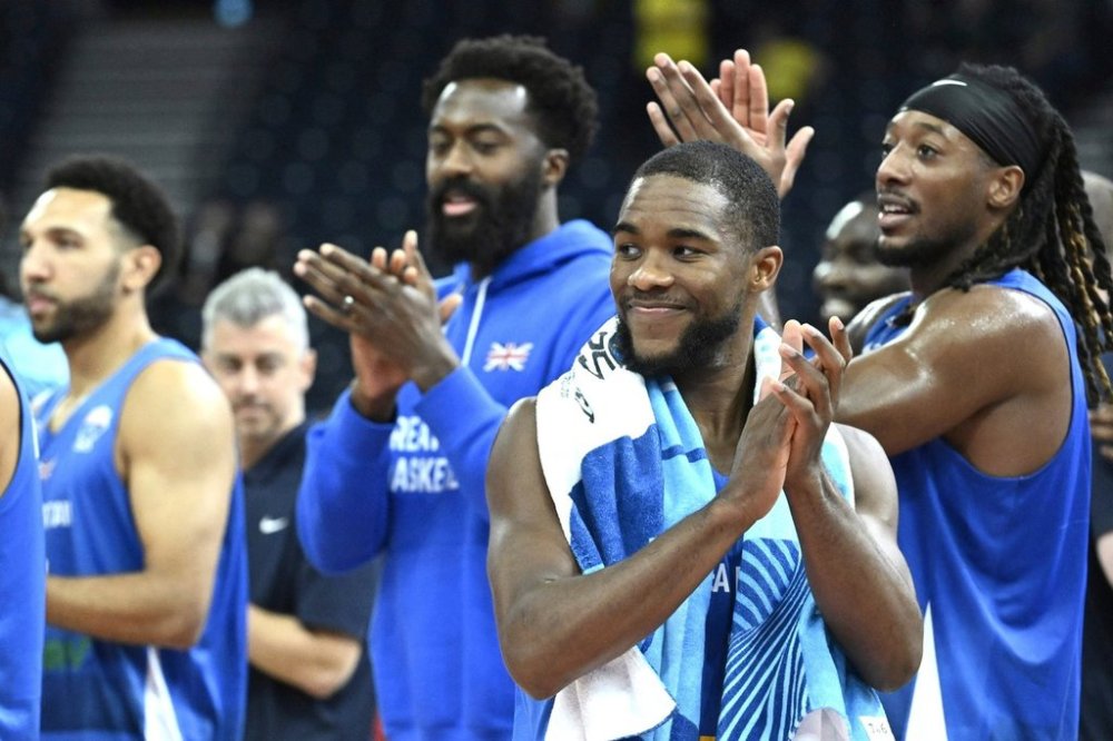 Britain's team celebrates after the Eurobasket, European Basketball Championship, group B match between Montenegro and Great Britain in Tampere, Finland, Wednesday, Sept. 3, 2025. (Heikki Saukkomaa/Lehtikuva via AP)
