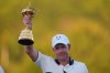 Europe's captain Luke Donald poses with the trophy after winning the Ryder Cup golf tournament against the United States on the Bethpage Black golf course, Sunday, Sept. 28, 2025, in Farmingdale, N.Y. (AP Photo/Lindsey Wasson)