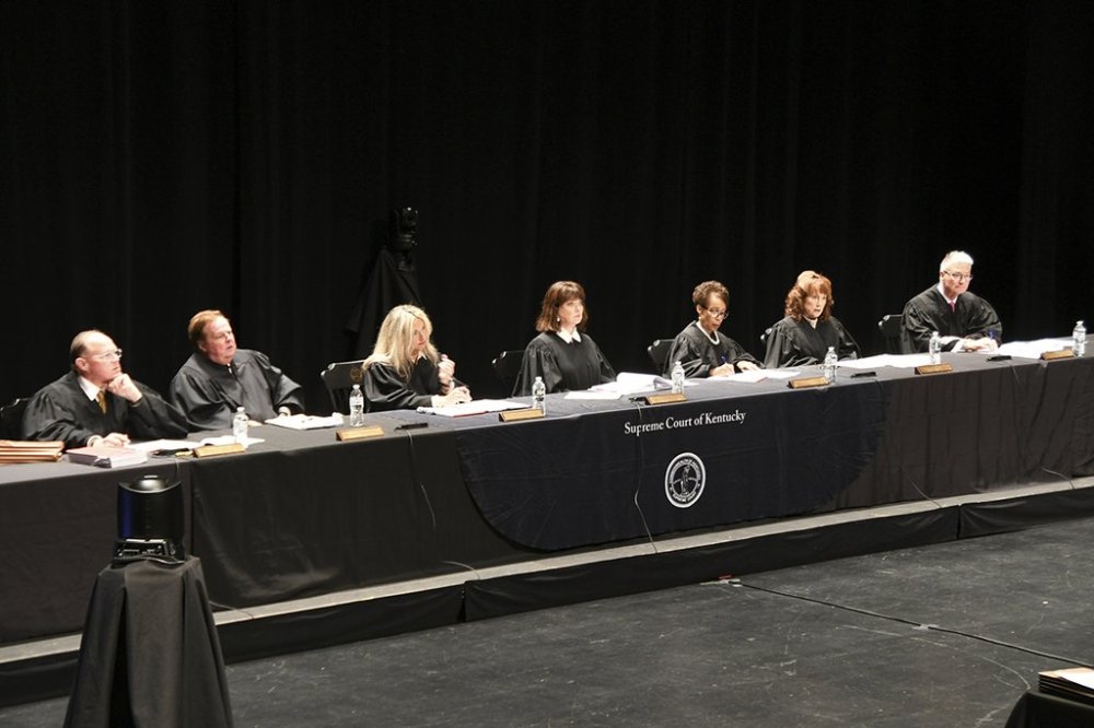 The Kentucky Supreme Court hears oral arguments at Centre College's Norton Center for the Arts in Danville, Ky., Sept. 10, 2025. Seated from left are Justice Shea Nickell, Justice Kelly Thompson, Justice Angela McCormick Bisig, Chief Justice of the Commonwealth Debra Hembree Lambert, Justice Pamela R. Goodwine, Justice Michelle M. Keller and Justice Robert B. Conley. (Jim Hoffman/Administrative Office of the Courts via AP)