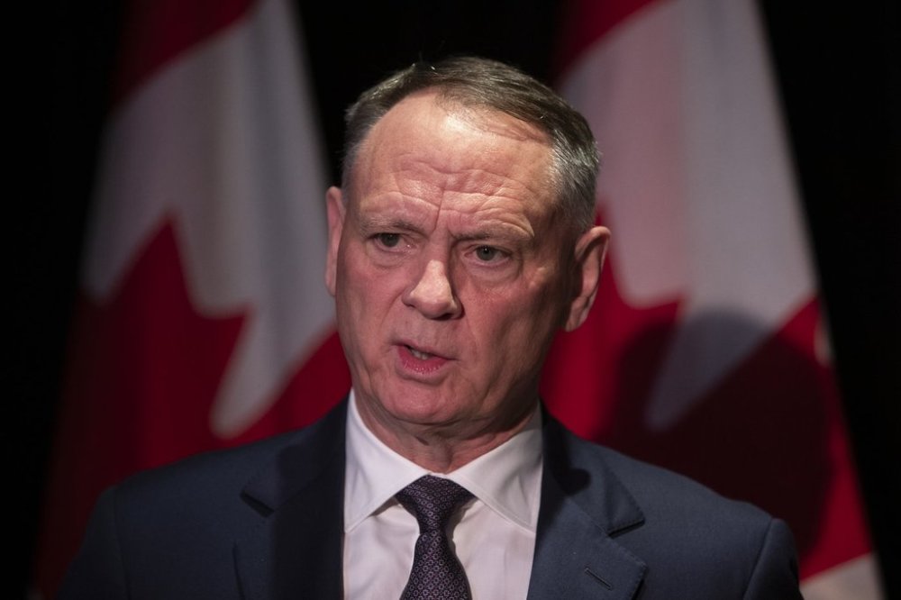 Minister of National Defence David McGuinty responds to questions at the Liberal caucus meeting in Edmonton on Wednesday, Sept. 10, 2025. THE CANADIAN PRESS/Amber Bracken