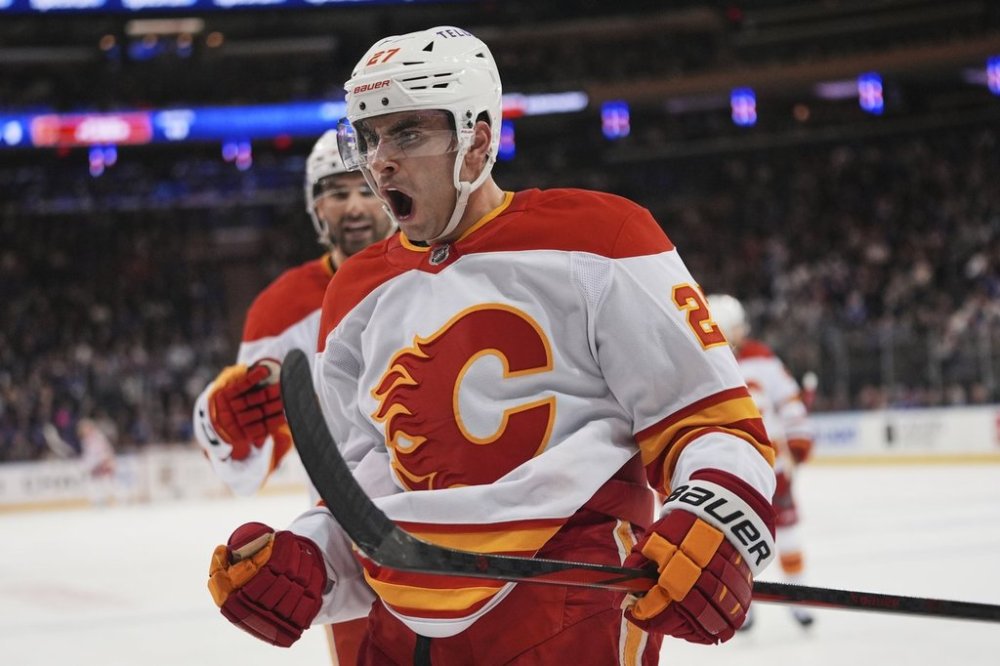 Calgary Flames' Matt Coronato (27) celebrates after scoring a goal during the first period of an NHL game against the New York Rangers on March 18, 2025, in New York. (AP Photo/Frank Franklin II)