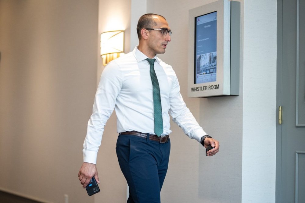 Coquitlam RCMP constable Mersad Mesbah returns to an RCMP code of conduct hearing on Wednesday, Sept. 17, 2025. THE CANADIAN PRESS/Ethan Cairns