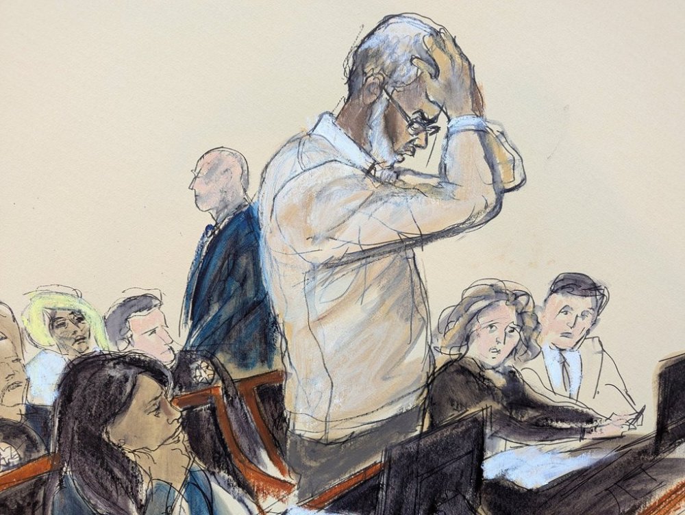 In this courtroom sketch, Sean Diddy Combs reacts as he makes a statement during his sentencing hearing in Manhattan federal court, Friday, Oct. 3, 2025, in New York. (Elizabeth Williams via AP)