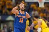 FILE - New York Knicks guard Jalen Brunson reacts after making a 3-pointer during the first half of Game 6 of the Eastern Conference finals of the NBA basketball playoffs against the Indiana Pacers in Indianapolis, May 31, 2025. (AP Photo/Michael Conroy, file)