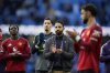 Manchester United's head coach Ruben Amorim and players walk off the pitch after the Premier League soccer match between Manchester City and Manchester United in Manchester, England, Sunday, Sept. 14, 2025. (AP Photo/Dave Thompson)
