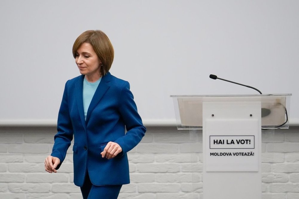 FILE - Moldova's President Maia Sandu leaves after speaking to the media during a press briefing after the polls closed for the presidential election runoff, in Chisinau, Moldova, Sunday, Nov. 3, 2024. (AP Photo/Vadim Ghirda, File)