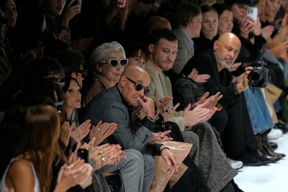 Stanley Tucci, centre left, and Meryl Streep, centre right, attend the Dolce & Gabbana Spring/Summer 2026 collection presented in Milan, Italy, Saturday, Sept. 27, 2025. (AP Photo/Luca Bruno)
