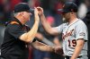 Detroit Tigers manager A.J. Hinch, left, greets relief pitcher Will Vest (19) after the Tigers defeated the Cleveland Guardians in a baseball game in Cleveland, Thursday, Sept. 25, 2025. (AP Photo/Sue Ogrocki)