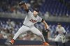 Detroit Tigers starting pitcher Tarik Skubal throws during the first inning of a baseball game against the Miami Marlins, Friday, Sept. 12, 2025, in Miami. (AP Photo/Lynne Sladky)