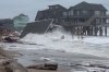 Waves from Hurricanes Humberto and Imelda destroy a home in Buxton, N.C., Tuesday, Sept. 30, 2025. (Heather Jennette via AP)