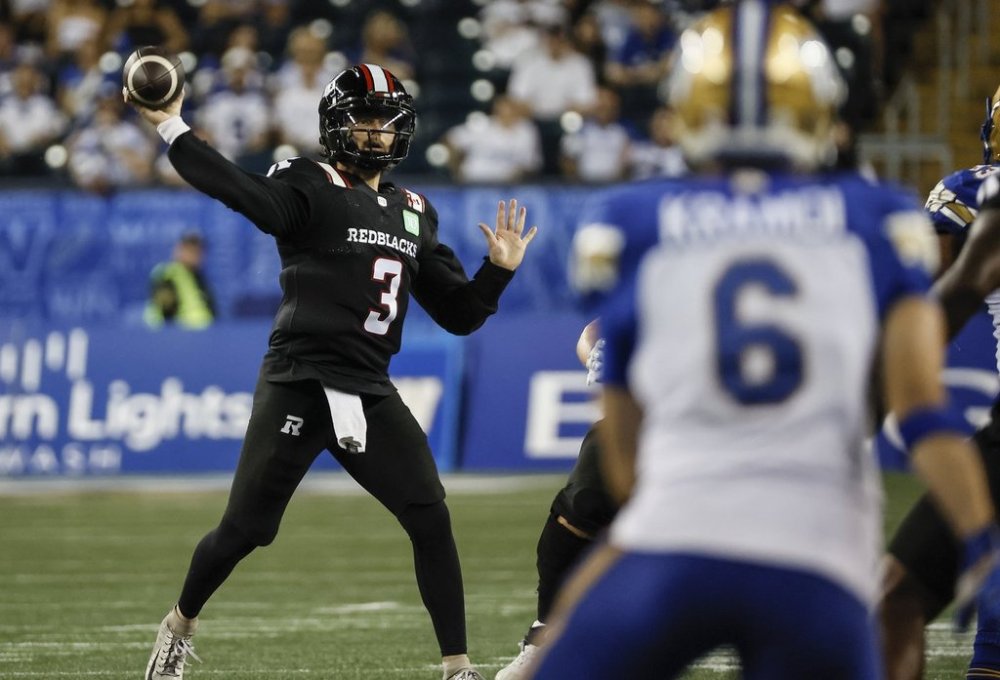 Ottawa Redblacks quarterback Dru Brown (3) throws a pass against the Blue Bombers in Winnipeg on Thursday, Aug. 14, 2025. THE CANADIAN PRESS/John Woods