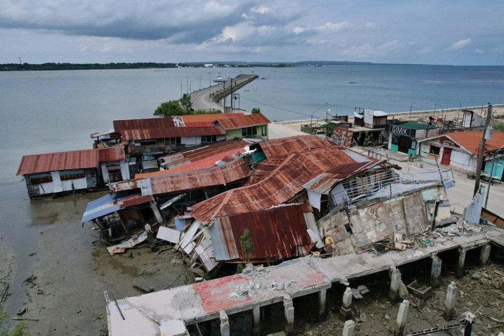 Business establishments that were damaged due to a recent strong earthquake lie at the Bogo city pier, Cebu Province, Central Philippines on Friday, Oct. 3, 2025. (AP Photo/Aaron Favila)