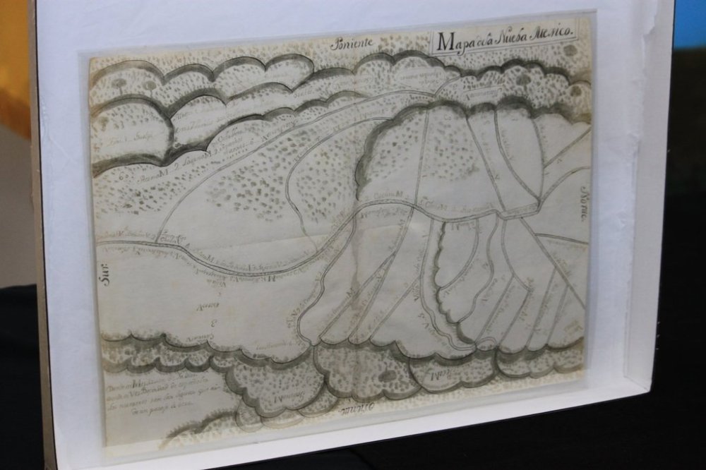 A centuries-old map is displayed at a ceremony marking its return to Mexico's national archives in Albuquerque, New Mexico, on Tuesday, Sept. 23, 2025. (AP Photo/Susan Montoya Bryan)