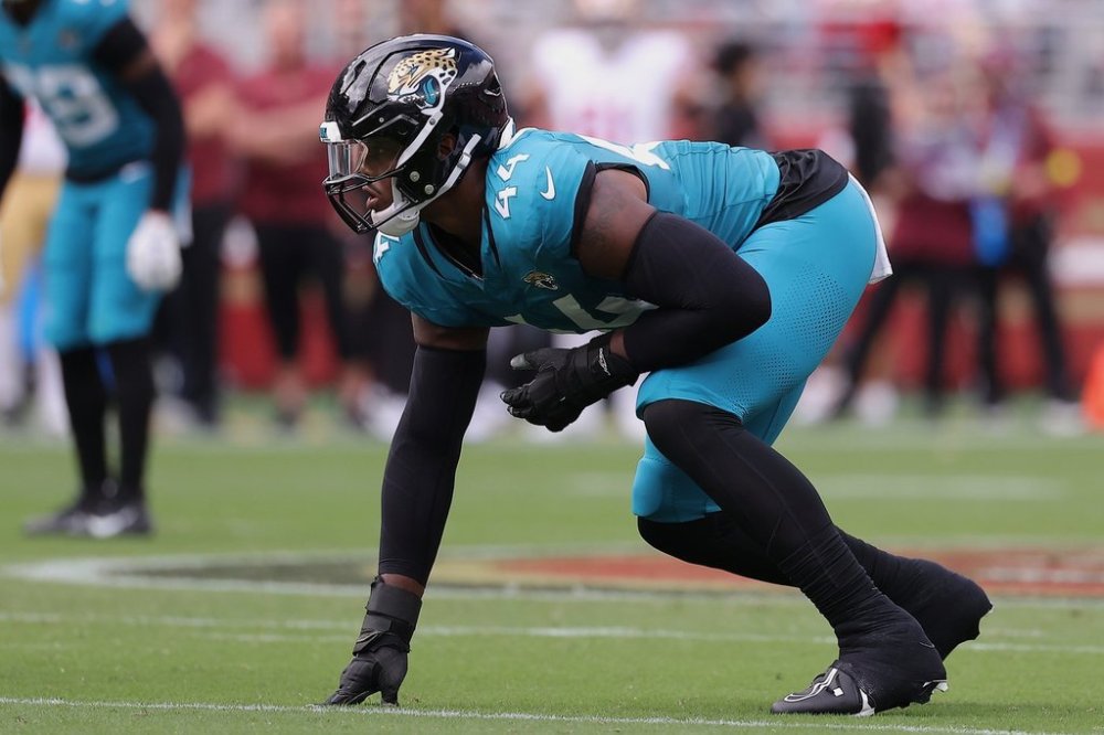 Jacksonville Jaguars defensive end Travon Walker waits for the snap at the line of scrimmage during the first half of an NFL football game against the San Francisco 49ers in Santa Clara, Calif., Sunday, Sept. 28, 2025. (AP Photo/Kelley L. Cox)