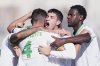 Roma's Bryan Cristante, back to camera, celebrates with teammates after scoring their side's second goal during a Serie A soccer match between Fiorentina and Roma at the Artemio Franchi stadium in Florence, Italy, Sunday, Oct. 5, 2025. (Alfredo Falcone/LaPresse via AP)