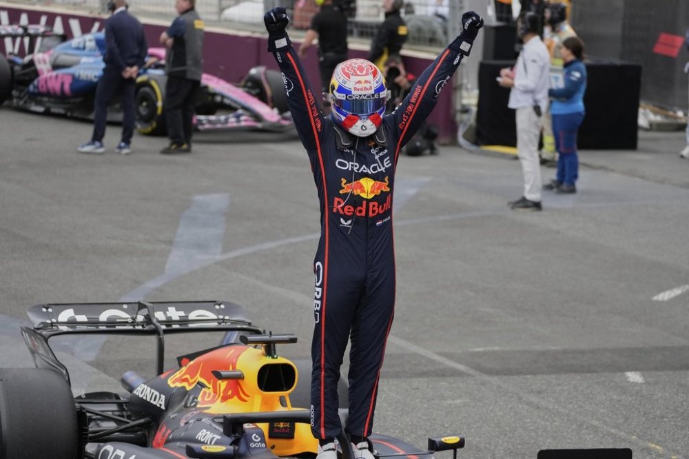 Red Bull driver Max Verstappen of the Netherlands celebrates after winning the Azerbaijan Formula One Grand Prix in Baku, Azerbaijan, Sunday, Sept. 21, 2025. (AP Photo/Darko Bandic)
