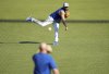 Toronto Blue Jays pitcher Alek Manoah, top, stretches out his arm during spring training in Dunedin Fla., on Monday, Feb. 17, 2025. THE CANADIAN PRESS/Nathan Denette