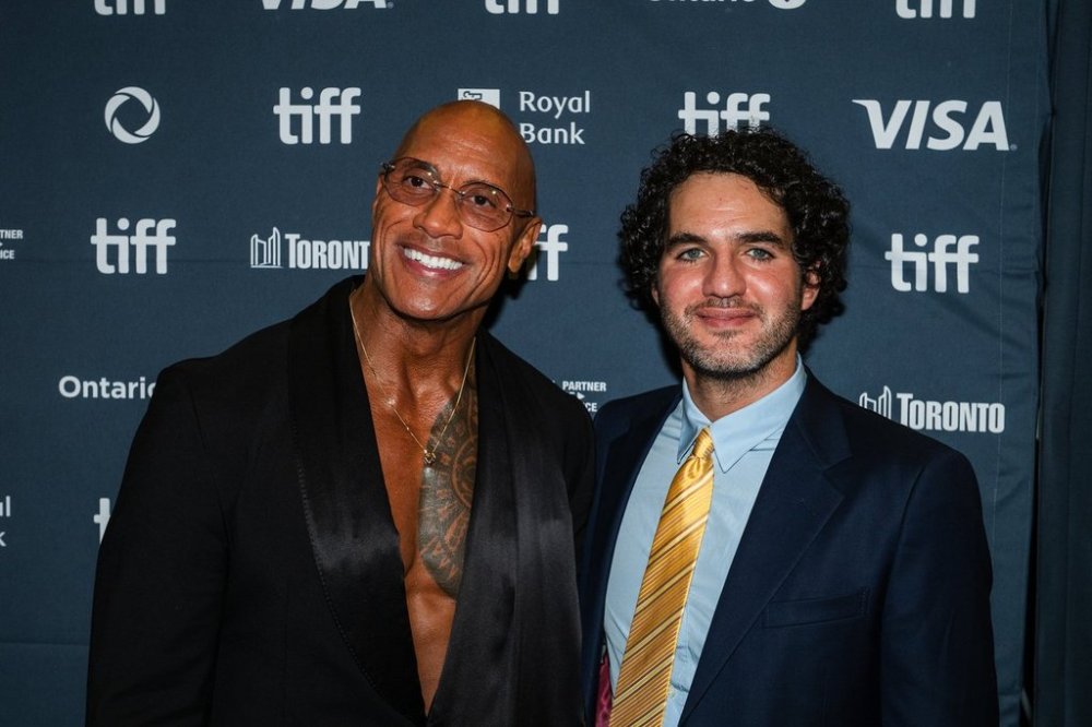 Dwayne Johnson, left, and Benny Safdie arrive on the red carpet for “The Smashing Machine” at the Toronto International Film Festival in Toronto, Monday, Sept. 8, 2025. THE CANADIAN PRESS/Laura Proctor