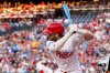 FILE - Philadelphia Phillies' Bryce Harper takes an at-bat during the first inning of a baseball game against the San Francisco Giants, April 14, 2025, in Philadelphia. (AP Photo/Chris Szagola, File)