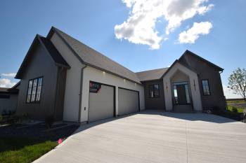 The sleek 1,916 sq. ft. bungalow is meticulously crafted to offer a perfect blend of luxury and livability.