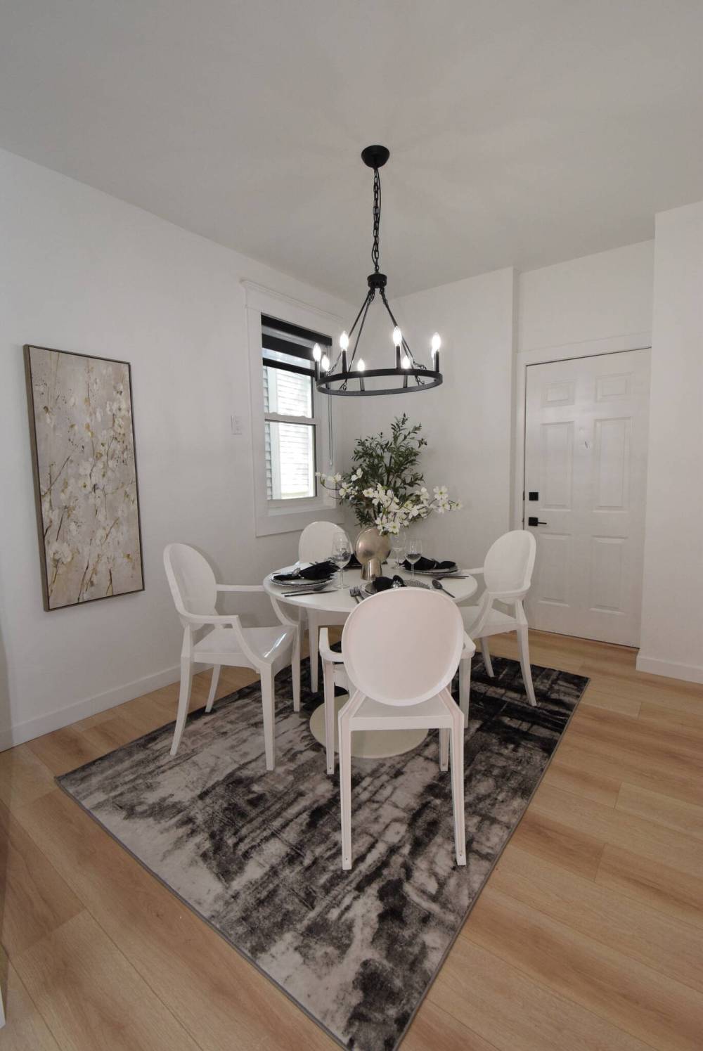 Just steps from the kitchen, the dining room has plenty of space for a table that seats four to eight, making it a perfect spot for dinner parties.