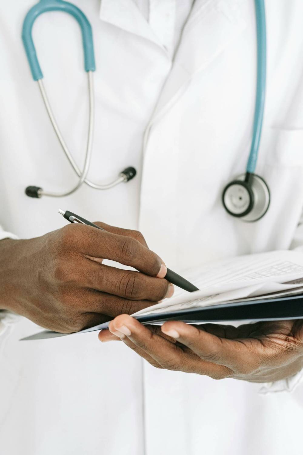Ivan Samkov / Pexels
Doctors writing notes to verify illness is taxing the health care system.