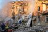 Efrem Lukatsky
                                Firefighters work at the site of a burning building after a Russian attack in Kyiv, Ukraine in August.