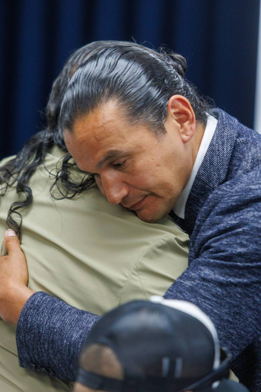 MIKE DEAL / FREE PRESSKinew hugs Barker at the media event.