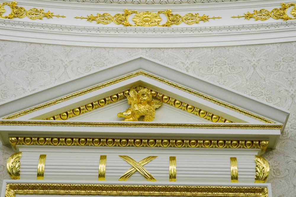 A detail of gold leaf above a doorway to the Oval Office and on the crown work. (Alex Brandon / The Associated Press files)