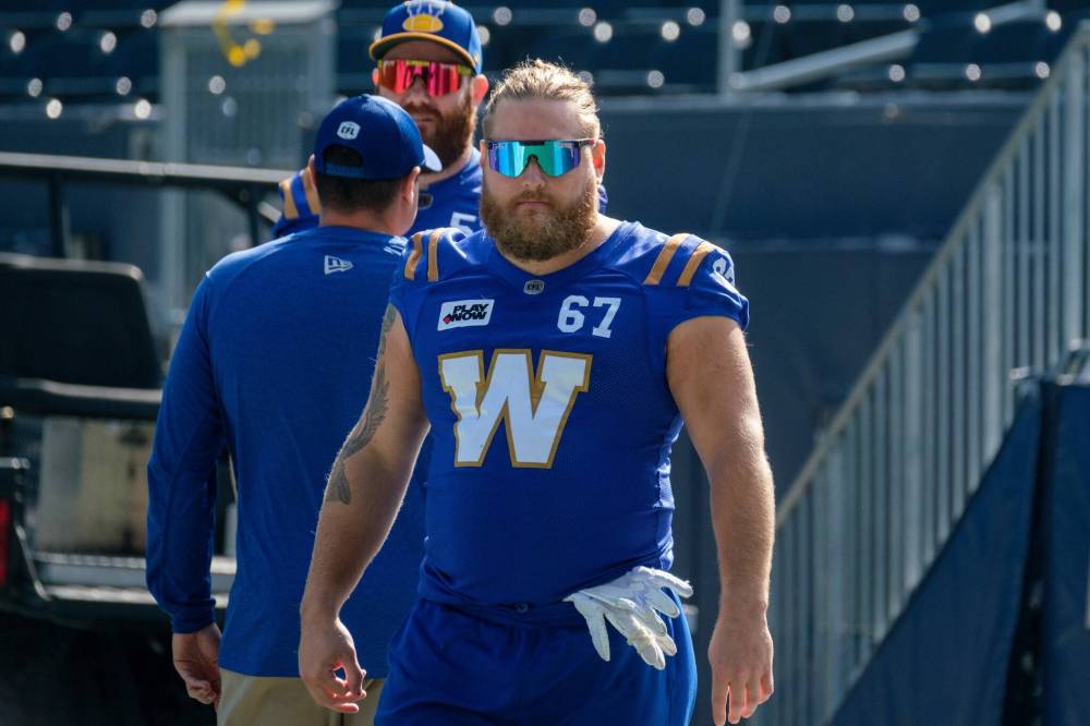 MIKE DEAL / FREE PRESS files
Blue Bombers centre Chris Kolankowski credits Ticats’ GM Ted Goveia with reviving his career after Kolankowski was released by the Toronto Argonauts.