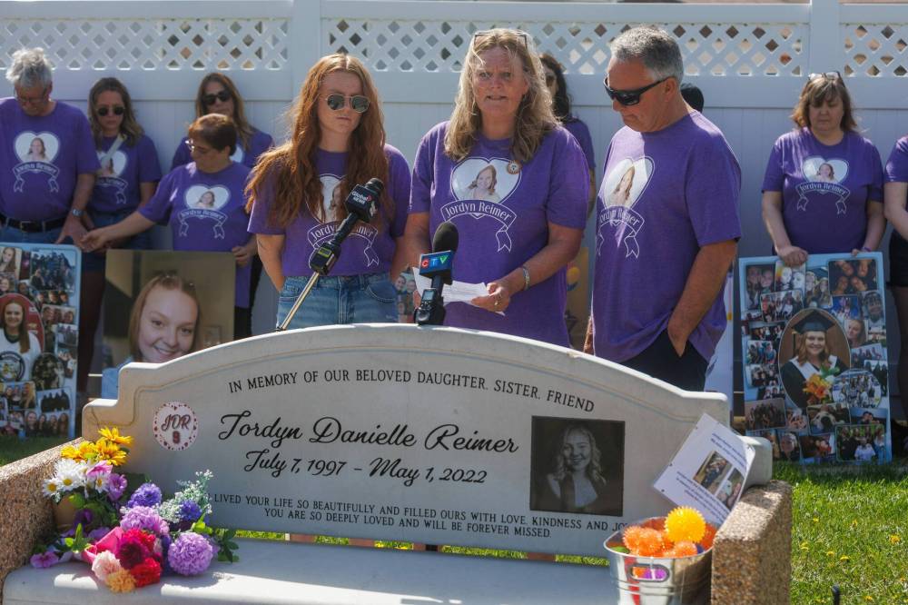 MIKE DEAL / FREE PRESS
The family of Jordyn Reimer (from left) Sister, Andrea, Mother, Karen, and father Doug, along with her many friends and supporters of MADD gather at Jordyn’s Memorial Bench on the Transcona Trail to raise awareness about impaired drivers, May 13, 2025.