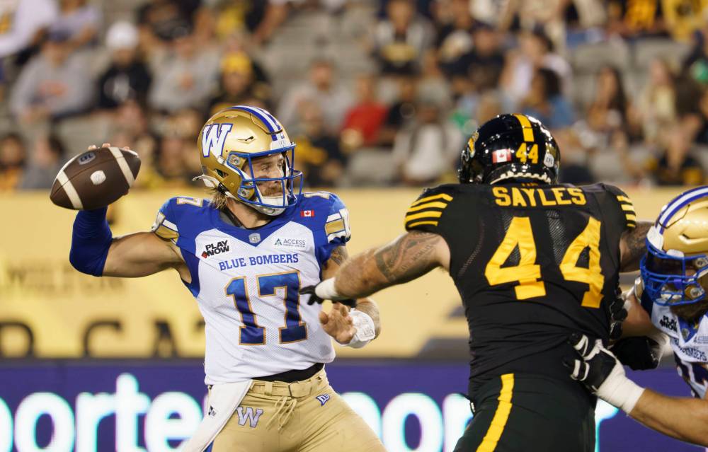 Peter Power / THE CANADIAN PRESS
Winnipeg Blue Bombers quarterback Chris Streveler makes a throw while under pressure during the first half. Streveler went 18-for-29 with 241 yards, one touchdown, and two interceptions — both coming in the first half.