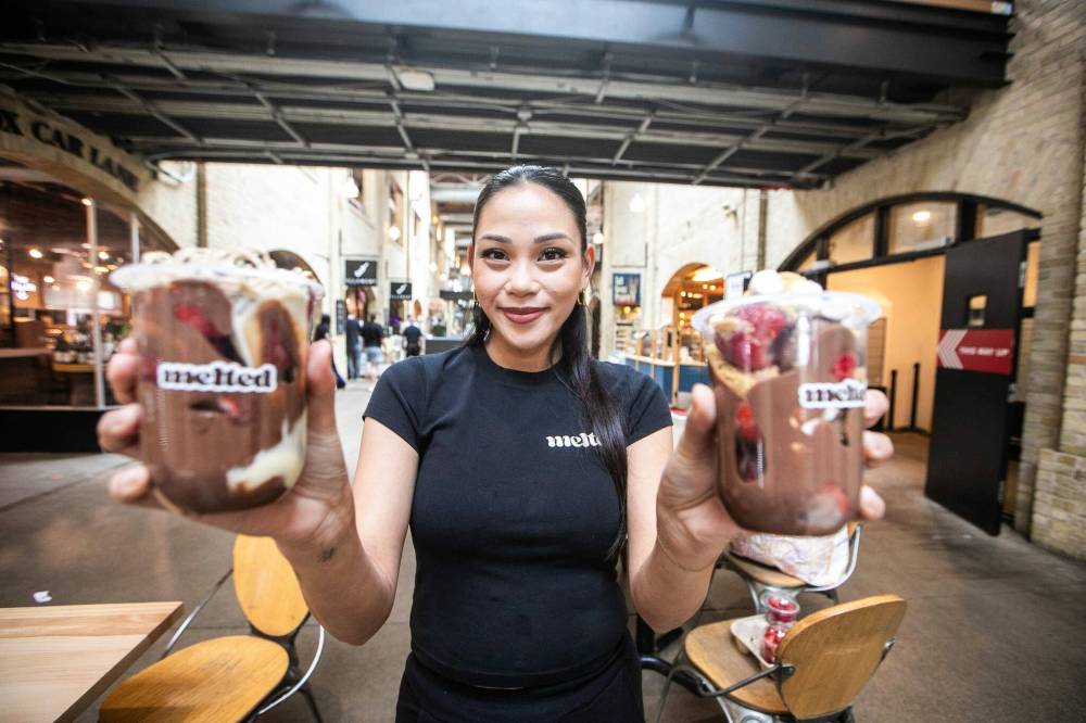MIKAELA MACKENZIE / FREE PRESS
Marridel Cloma Tuazon, founder of Melted, shows off her venture’s popular concoctions.