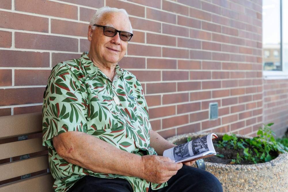 MIKE DEAL / FREE PRESS
Gerald Brown was the chief librarian at Winnipeg School Division until his retirement. Now, he runs the massive library in his building.