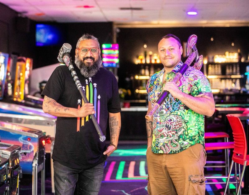 MIKAELA MACKENZIE / FREE PRESS
                                Raj Maniar (left) and Adam Dudek, owners of Smash n Axe Arcade Disco, a new business that combines four axe throwing lanes, two rage rooms, numerous arcade games and a bar.